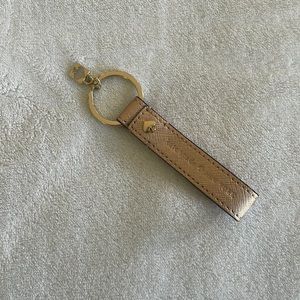 Kate spade keychain , in great condition . Perfect stocking stuffer!